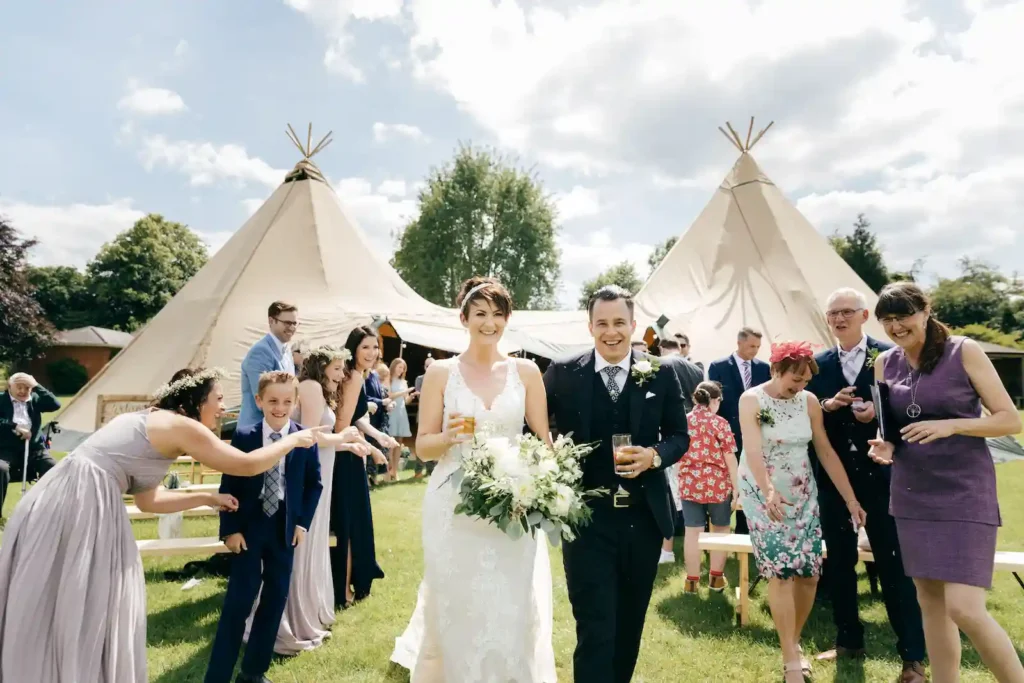 A beautiful Tipi Glamping Wedding with Bell Tents in WIltshire provided by Cotswold Tipis