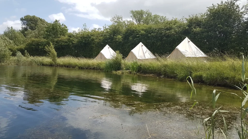 Brilliant Bell Tent Hire - Brilliant Bell Tent Hire bell tents in a row next to a lake