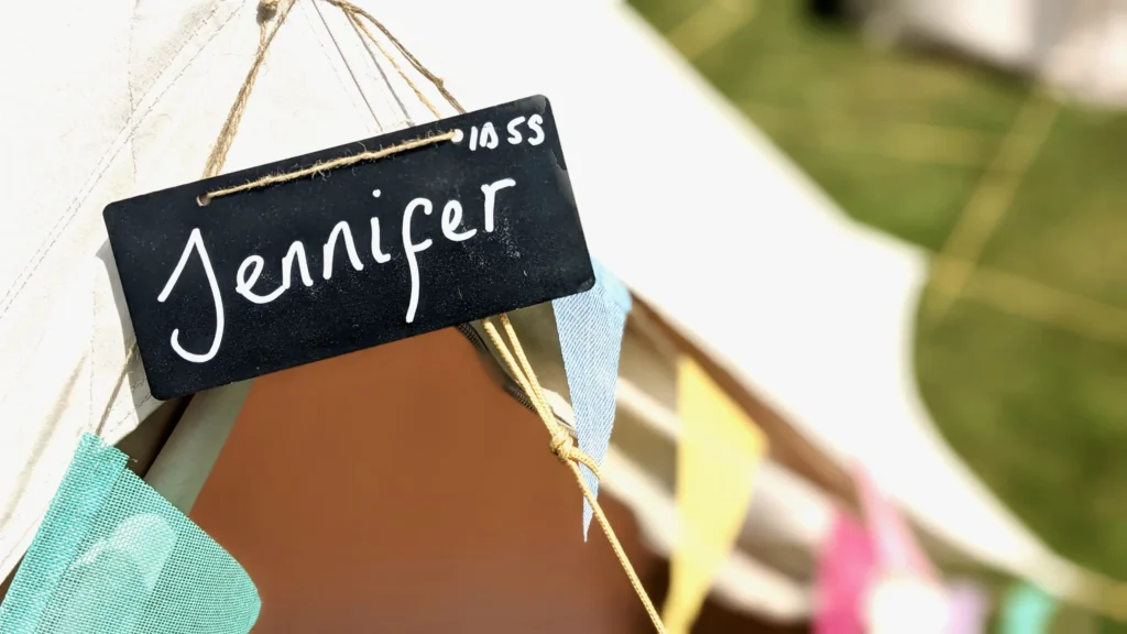 Brilliant Bell Tent Hire - cute chalkboard name outside the tent for a wedding bell tent village