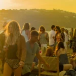 Parties and Events Bell Tent Hire - Glamping by Brilliant Bell Tent Hire. People at and outdoor party in the sun