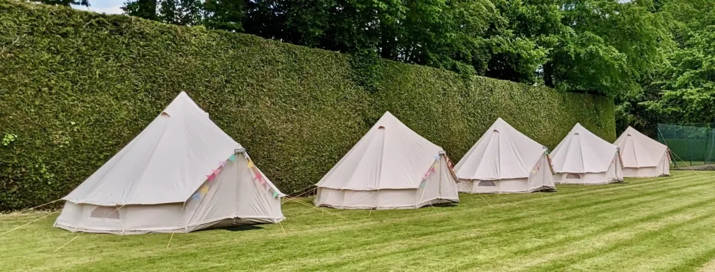 Birthday party bell tent hire setup for garden celebration