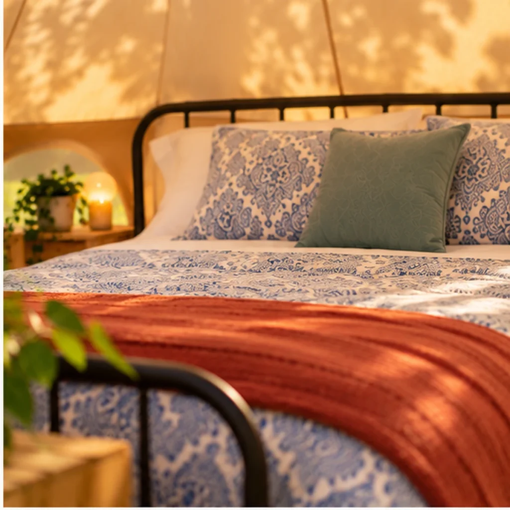 Honeymoon Brilliant Bell Tent Hire-Paisley-bedding-closeup